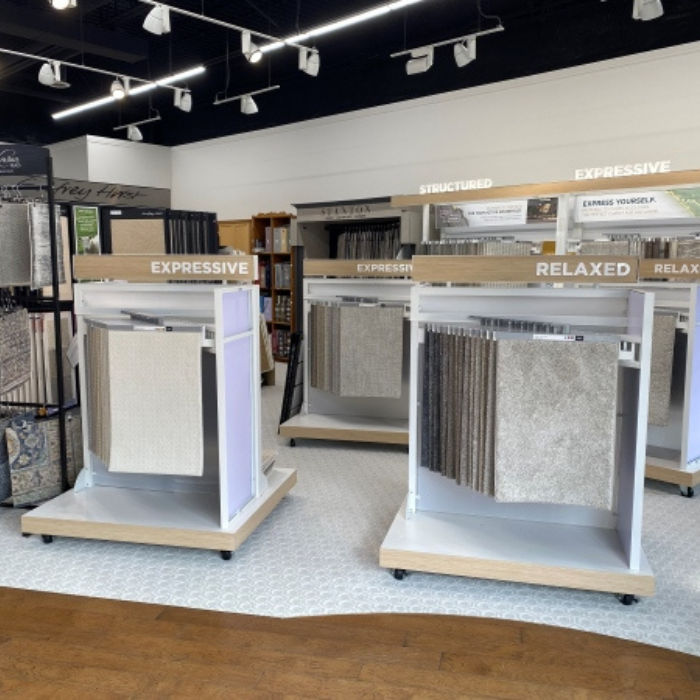 Inside Dean’s Carpet One Duntroon showroom with carpet and flooring displays.